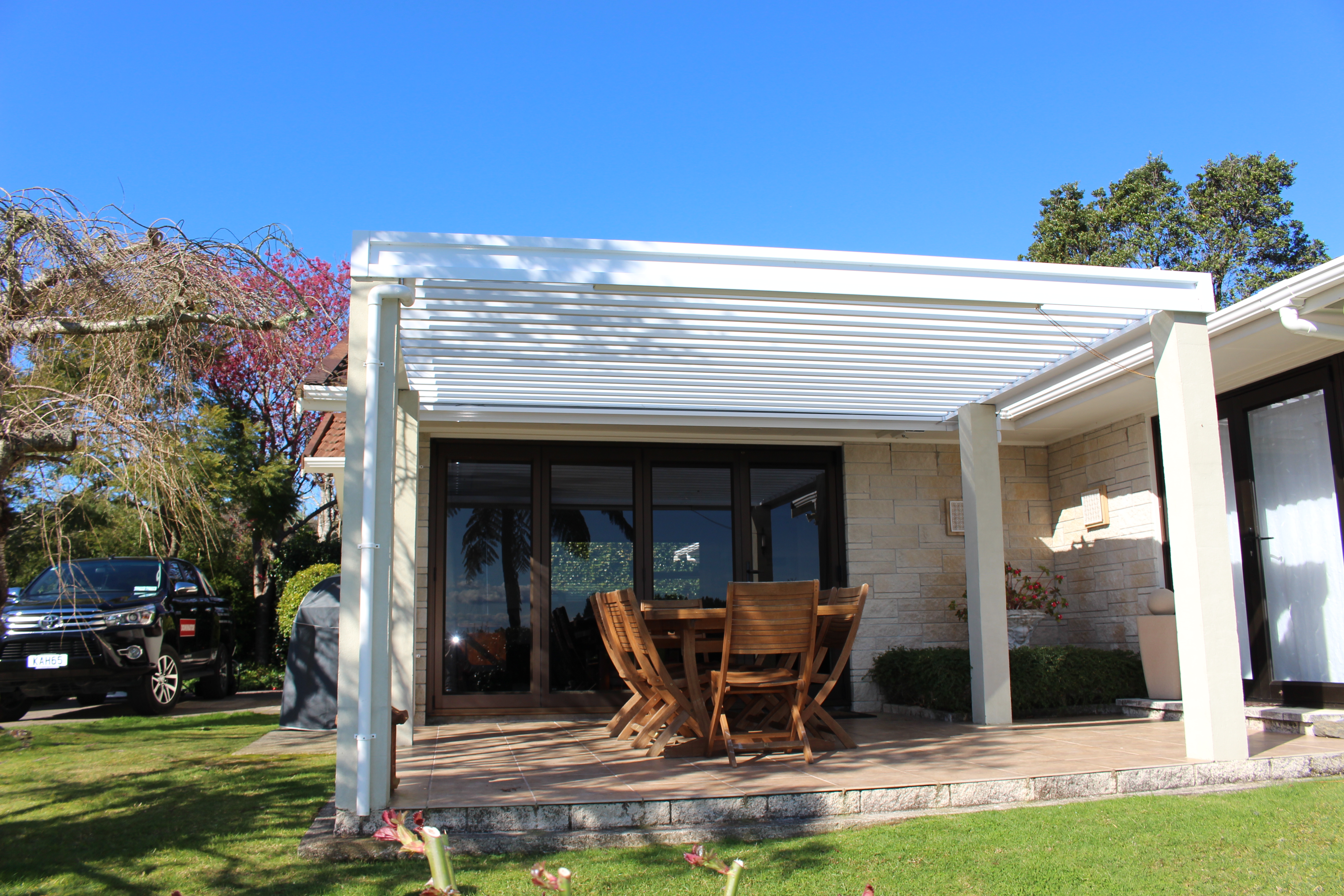 Bask Louvre Roof custom made to fit in where an old pergola roof was previously