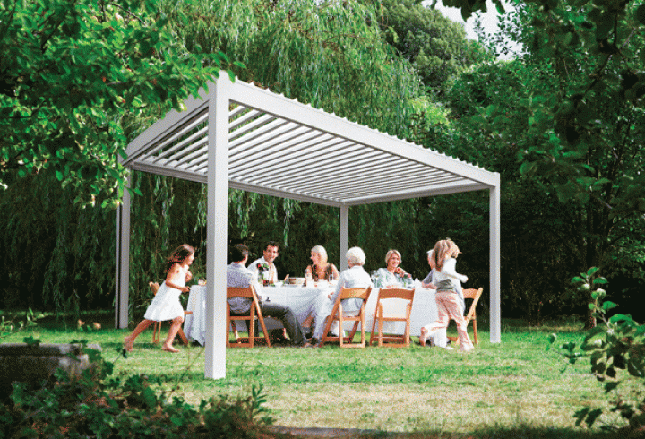Freestanding Bask Louvre roof with family in summer picnic